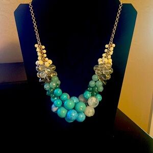 Lia Sophia turquoise necklace. Dull gold chain.